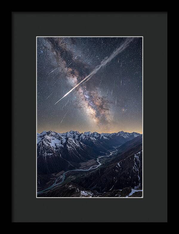 Celestial Dance Above Rugged Peaks