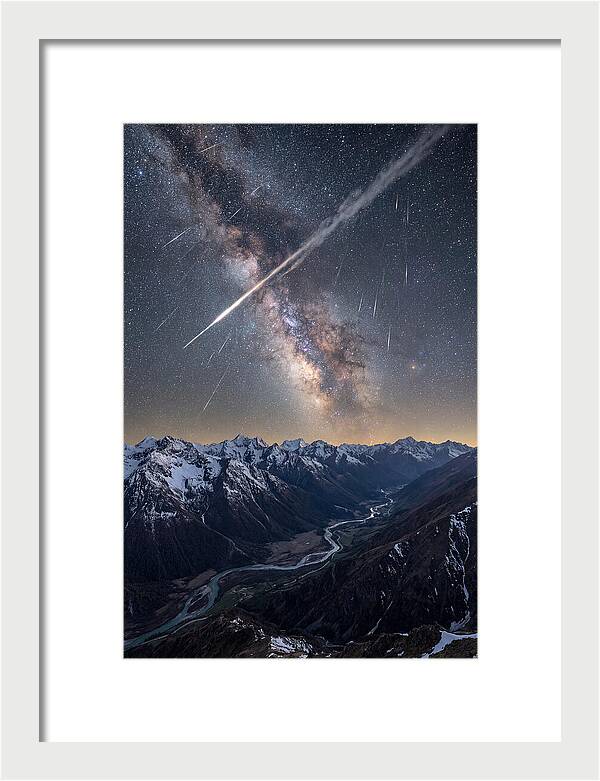 Celestial Dance Above Rugged Peaks