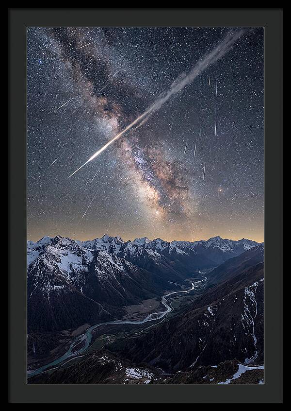 Celestial Dance Above Rugged Peaks