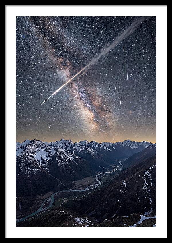 Celestial Dance Above Rugged Peaks