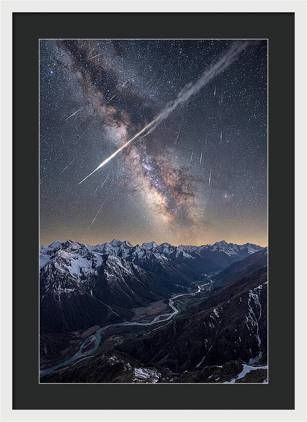 Celestial Dance Above Rugged Peaks