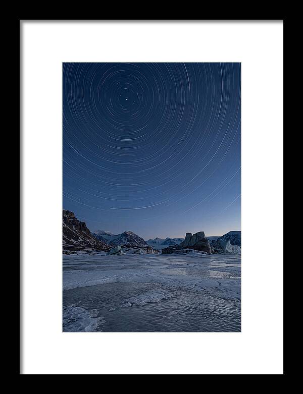 Celestial Star Trails Over Arctic Landscape
