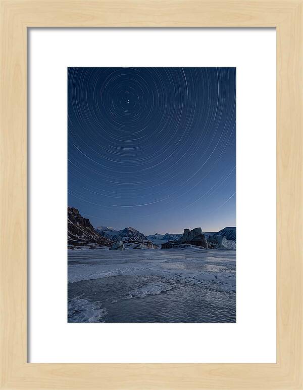 Celestial Star Trails Over Arctic Landscape