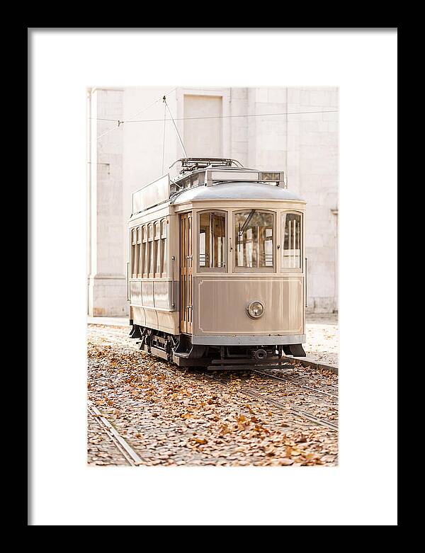 City Heritage Tram Amidst Autumn Leaves
