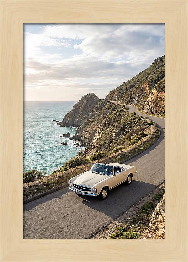 Classic Convertible Along Coastal Road
