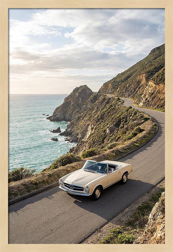 Classic Convertible Along Coastal Road