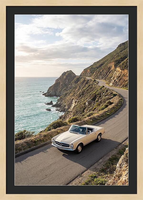 Classic Convertible Along Coastal Road