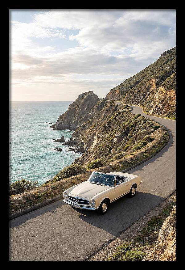 Classic Convertible Along Coastal Road