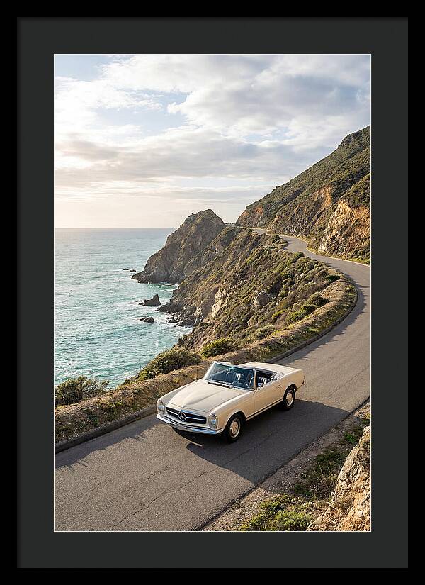 Classic Convertible Along Coastal Road
