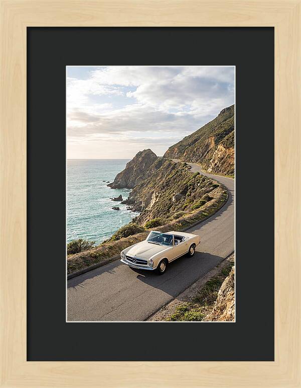 Classic Convertible Along Coastal Road