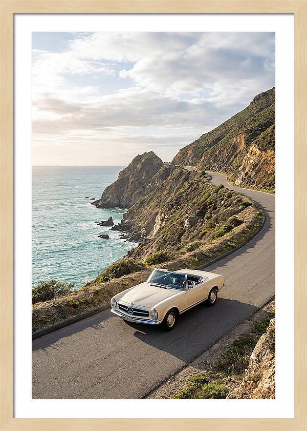 Classic Convertible Along Coastal Road