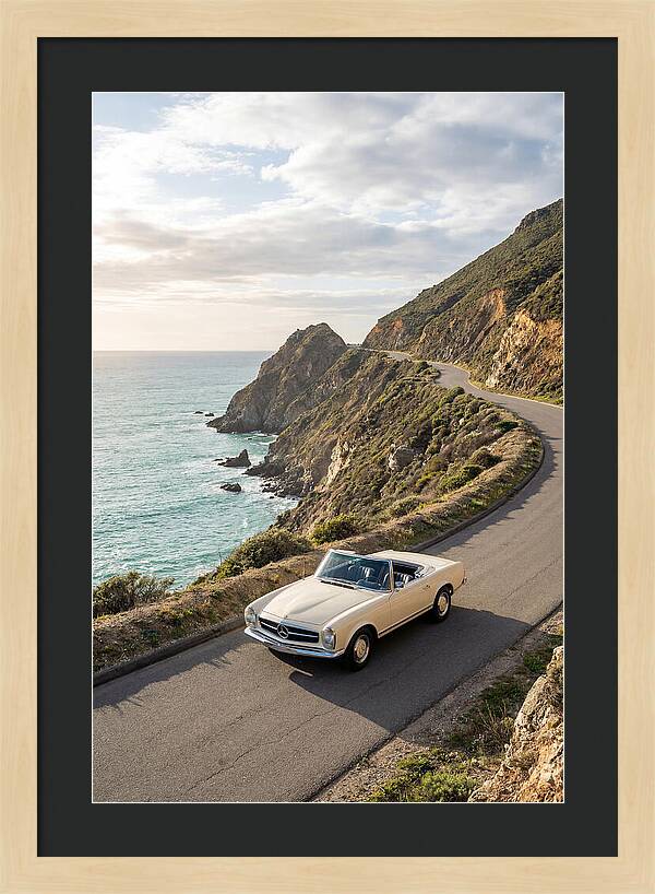 Classic Convertible Along Coastal Road