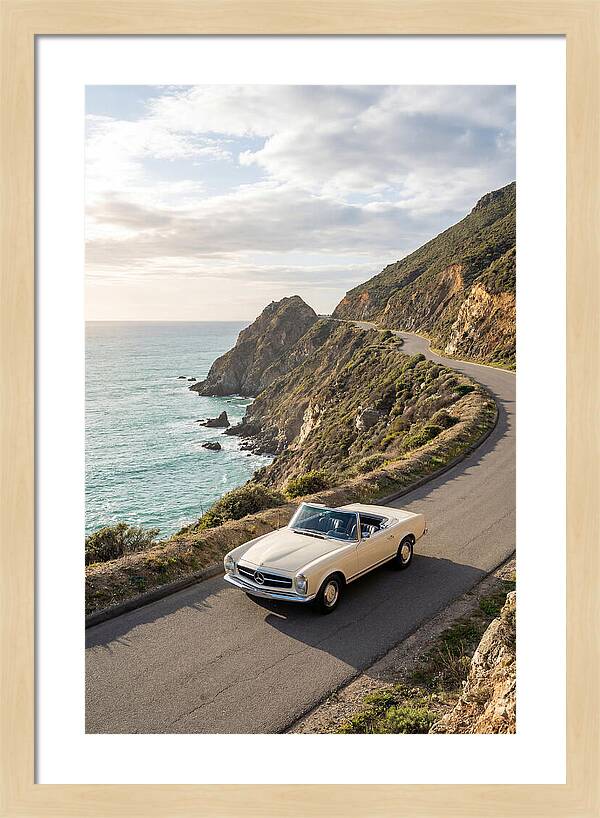 Classic Convertible Along Coastal Road