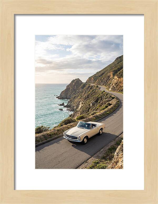 Classic Convertible Along Coastal Road