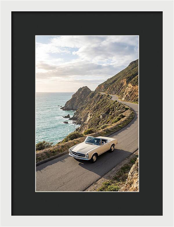 Classic Convertible Along Coastal Road