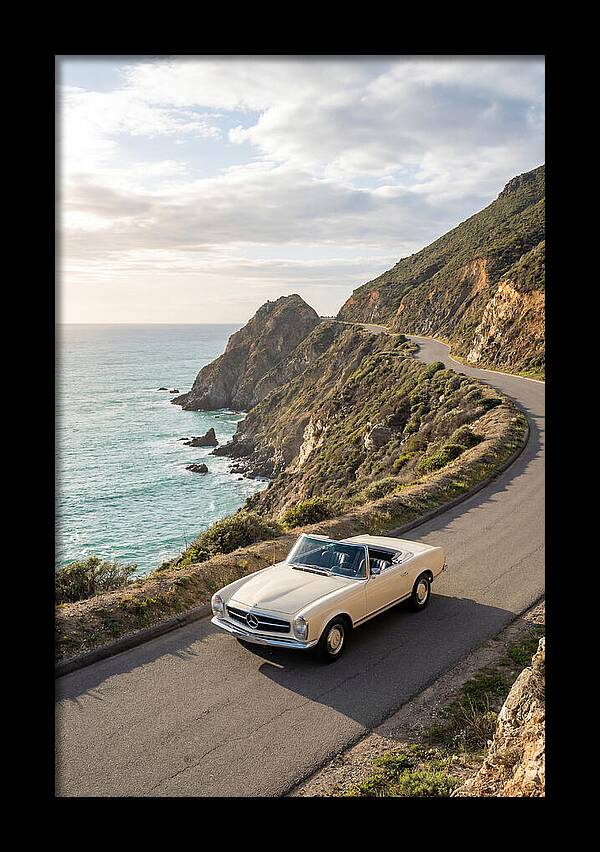 Classic Convertible Along Coastal Road