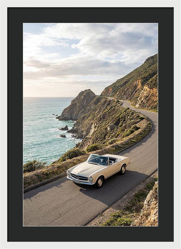 Classic Convertible Along Coastal Road