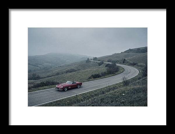Classic Red Ferrari On Winding Road