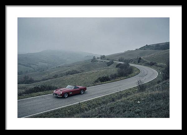 Classic Red Ferrari On Winding Road