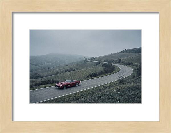 Classic Red Ferrari On Winding Road