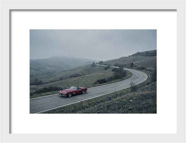 Classic Red Ferrari On Winding Road