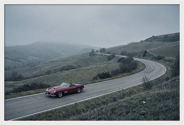 Classic Red Ferrari On Winding Road