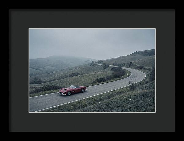 Classic Red Ferrari On Winding Road