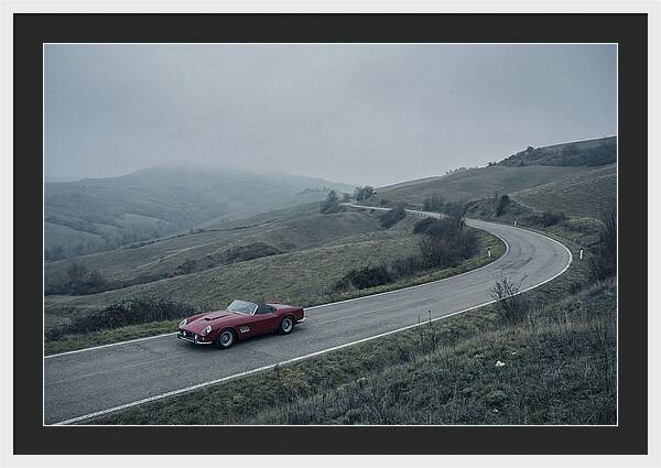 Classic Red Ferrari On Winding Road