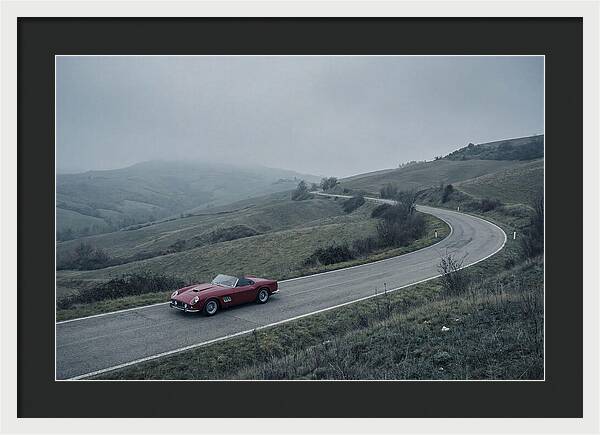Classic Red Ferrari On Winding Road