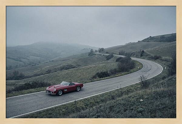 Classic Red Ferrari On Winding Road