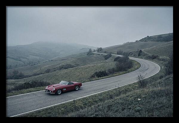 Classic Red Ferrari On Winding Road