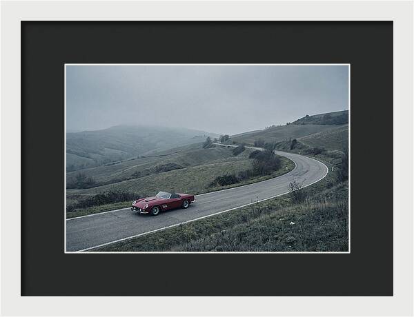 Classic Red Ferrari On Winding Road