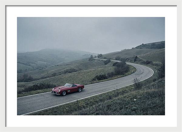 Classic Red Ferrari On Winding Road