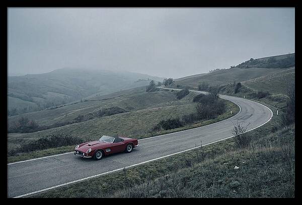Classic Red Ferrari On Winding Road