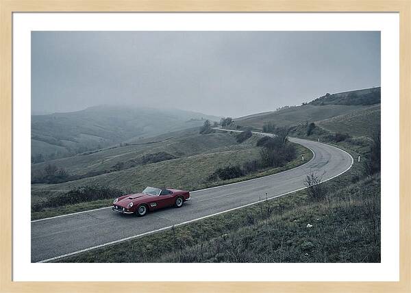 Classic Red Ferrari On Winding Road