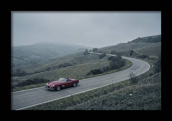 Classic Red Ferrari On Winding Road