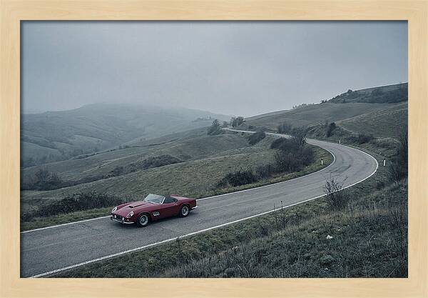 Classic Red Ferrari On Winding Road