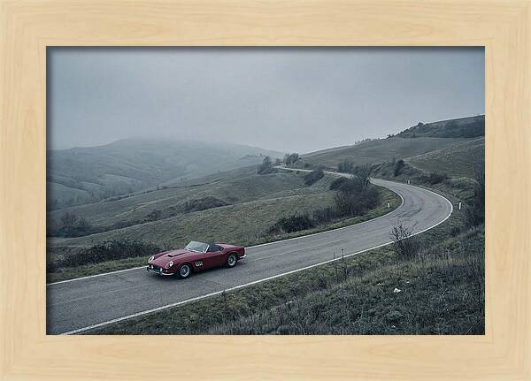 Classic Red Ferrari On Winding Road