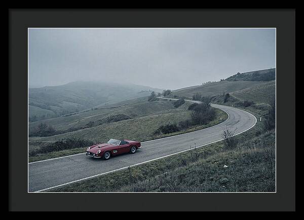 Classic Red Ferrari On Winding Road