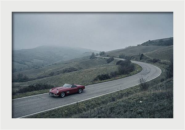 Classic Red Ferrari On Winding Road
