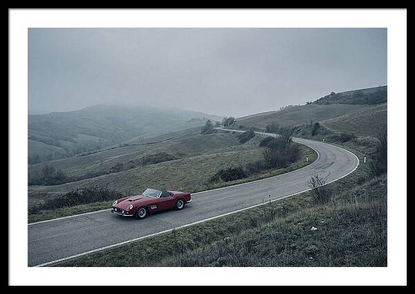 Classic Red Ferrari On Winding Road