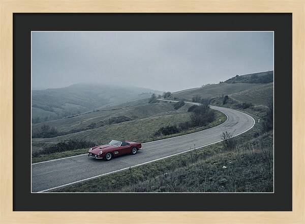 Classic Red Ferrari On Winding Road