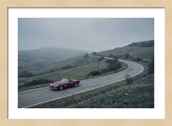 Classic Red Ferrari On Winding Road
