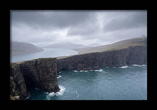Cliff Edge Over Lake Srvgsvatn