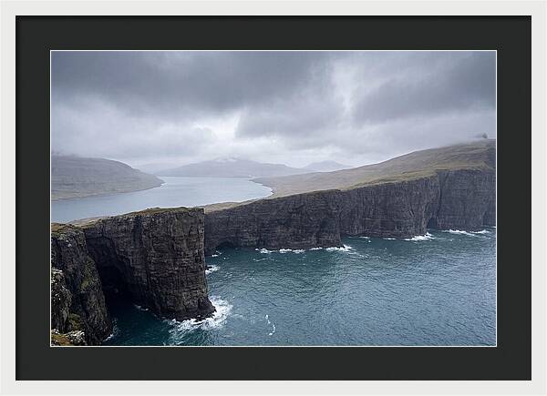 Cliff Edge Over Lake Srvgsvatn