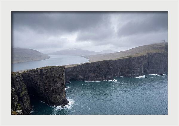 Cliff Edge Over Lake Srvgsvatn