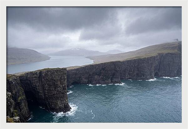 Cliff Edge Over Lake Srvgsvatn