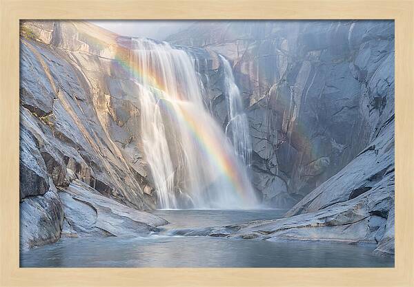 Cliff Face Waterfall With Rainbow
