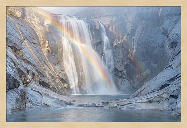Cliff Face Waterfall With Rainbow