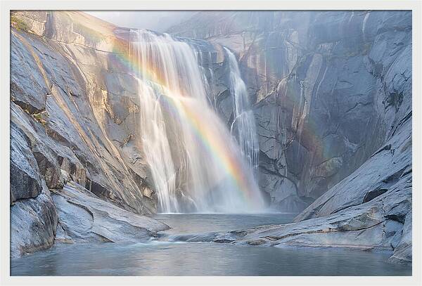 Cliff Face Waterfall With Rainbow